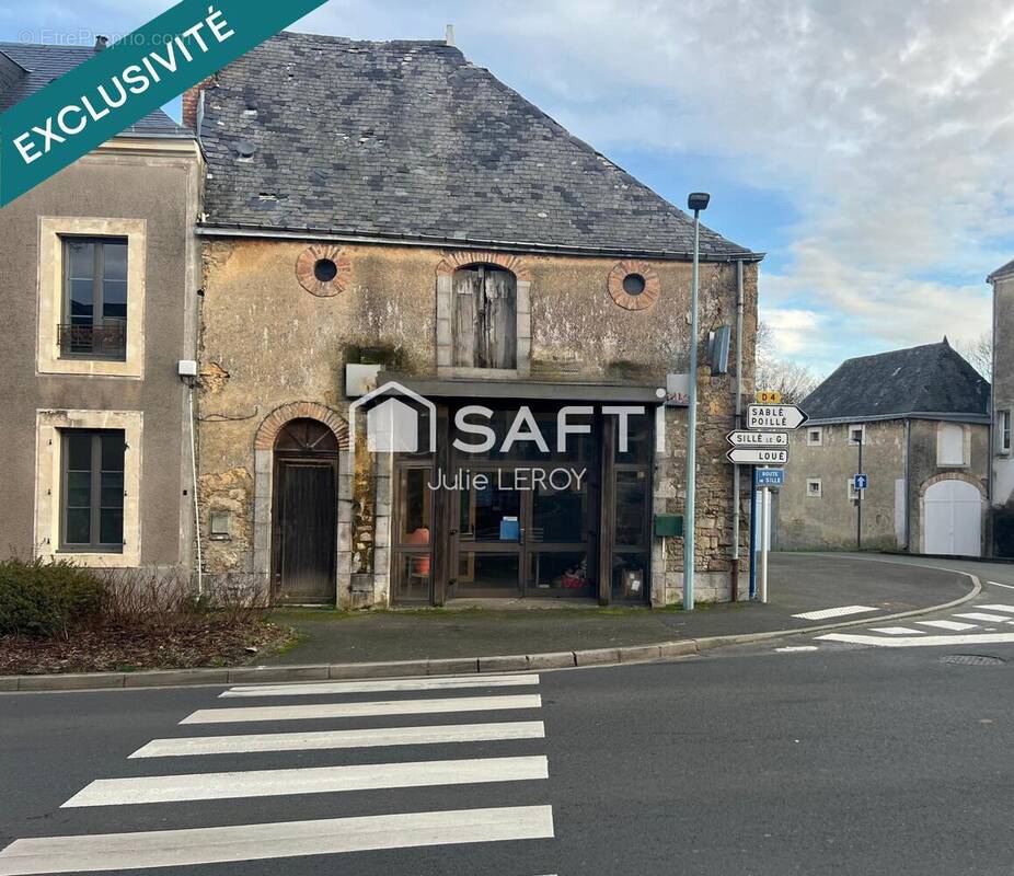 Photo 1 - Commerce à BRULON