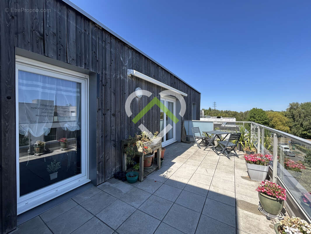 WASQUEHAL CENTRE - T4 en dernier étage - Terrasse 20m2 - Garage fermé - photo 8