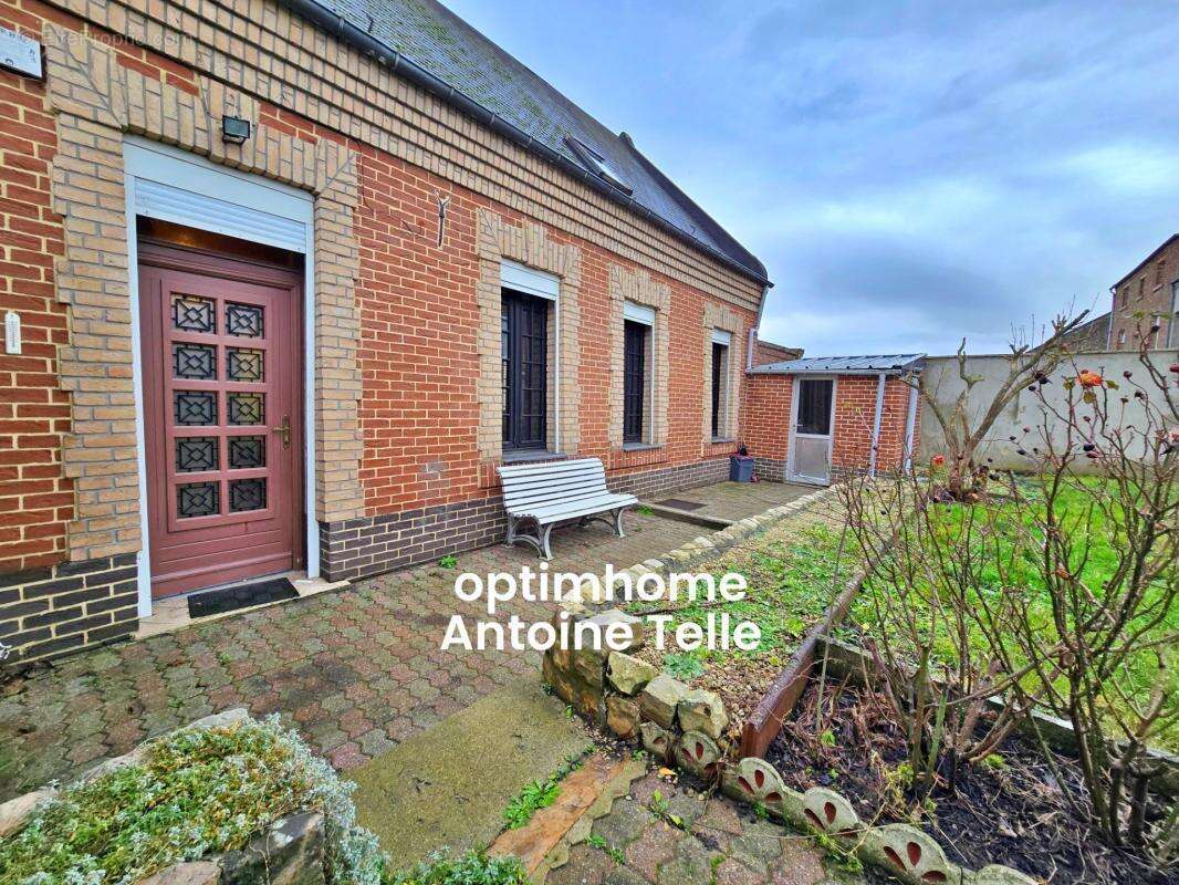 Le Cateau - Maison semi-individuelle à double accès avec garage, devanture & jardin clos sur 960m² - photo 10