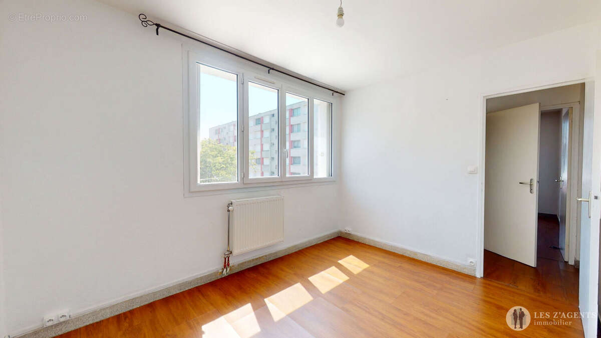 T3 avec balcon dans une copropriété fermée - photo 8
