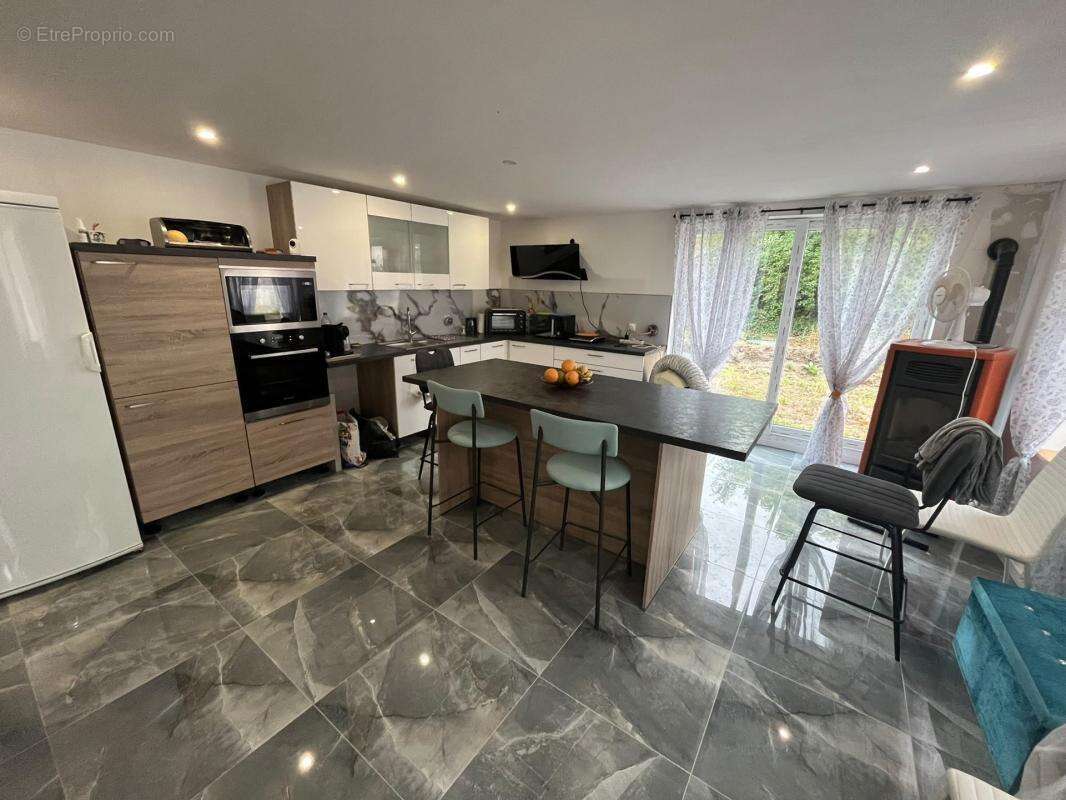  Maison entièrement refaite à neuf – 3 chambres, garage & terrasse !  - photo 2