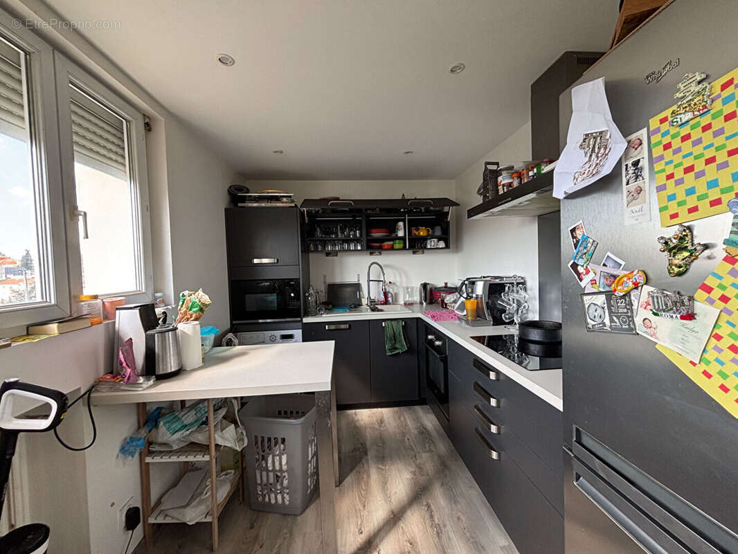 Photo 2 - Appartement à SAINT-JEAN-BONNEFONDS