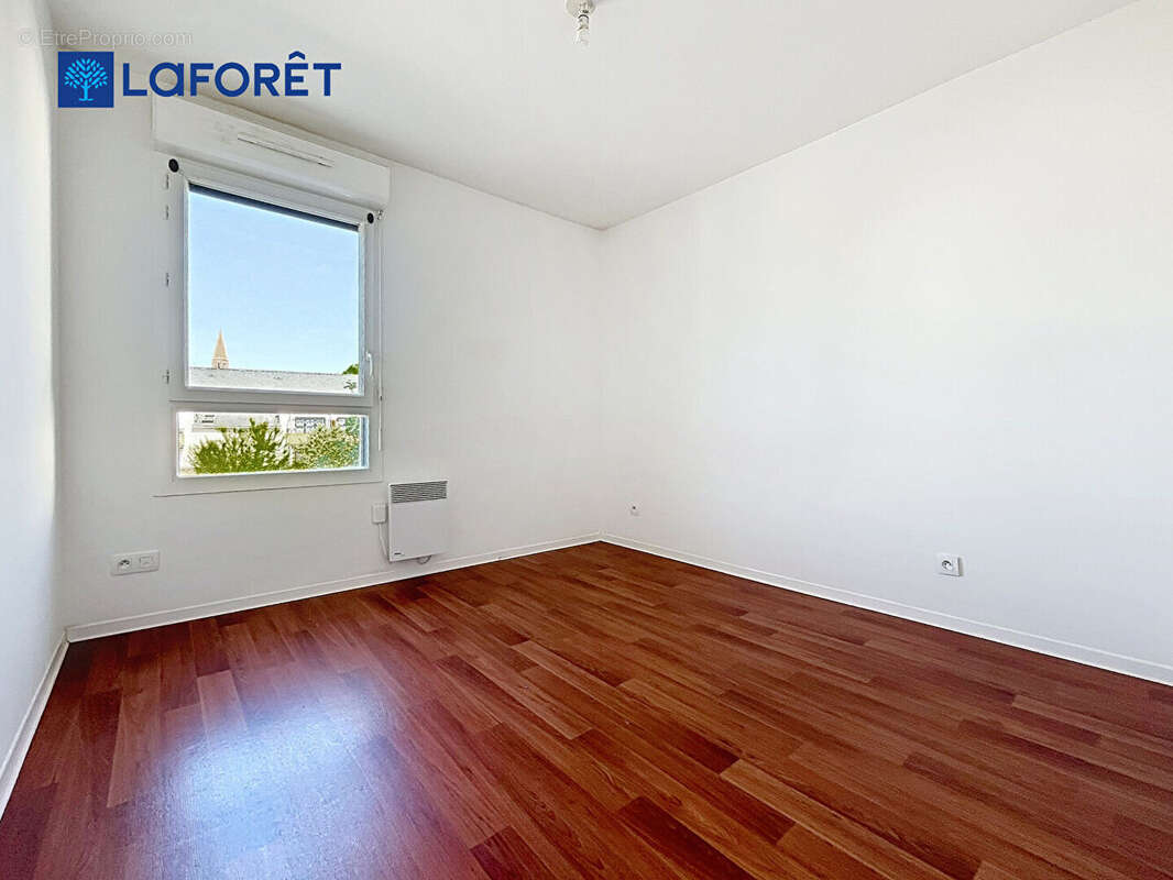 Au Centre de Guidel, Appartement 68m²,  2 chambres, terrasse, jardin, 2 stationnements - photo 8