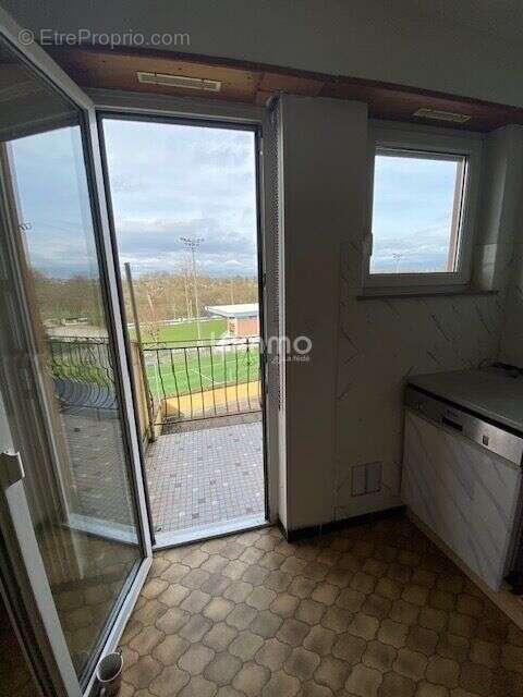 Immeuble comprenant un local commercial et deux appartements - photo 14