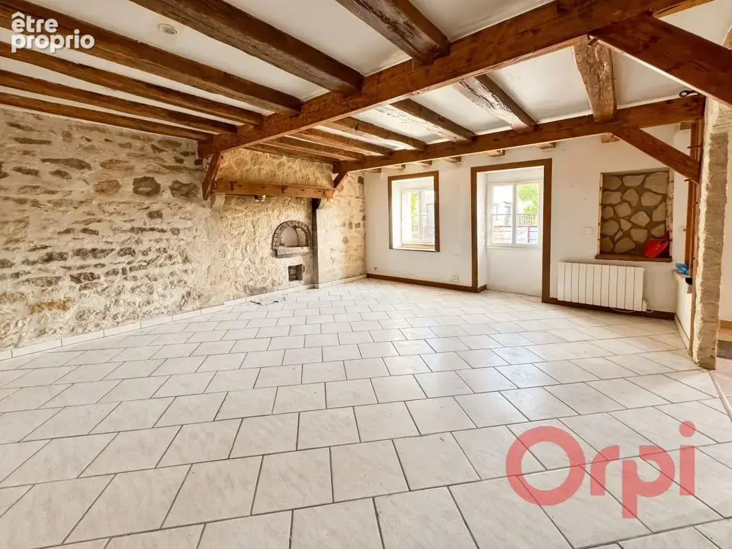 Maison de caractère à vendre à Épineuil-le-Fleuriel – Pierre apparente - photo 2