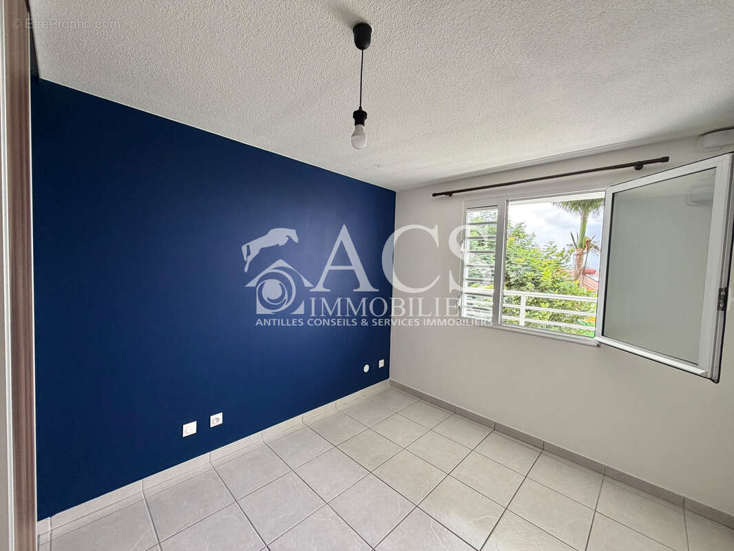 Appartement de type F3 -  Vue dégagée - Morne Pavillon - LE LAMENTIN - photo 8