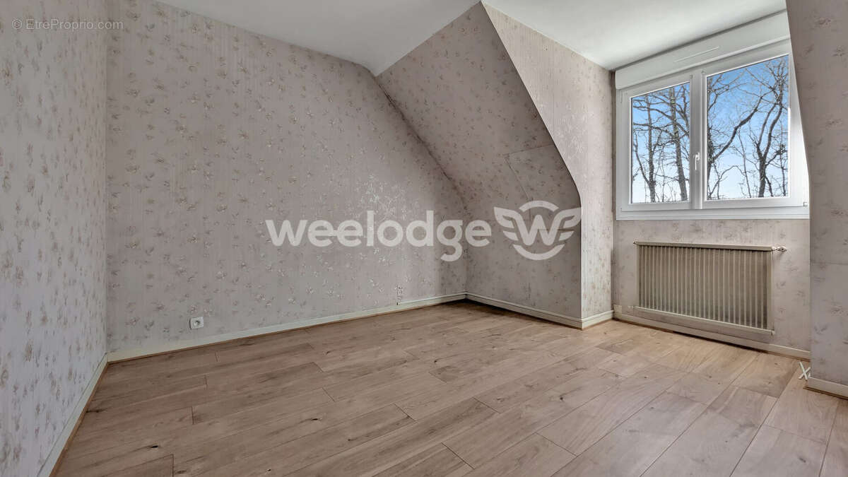 Chambre 2 - Maison à CARQUEFOU