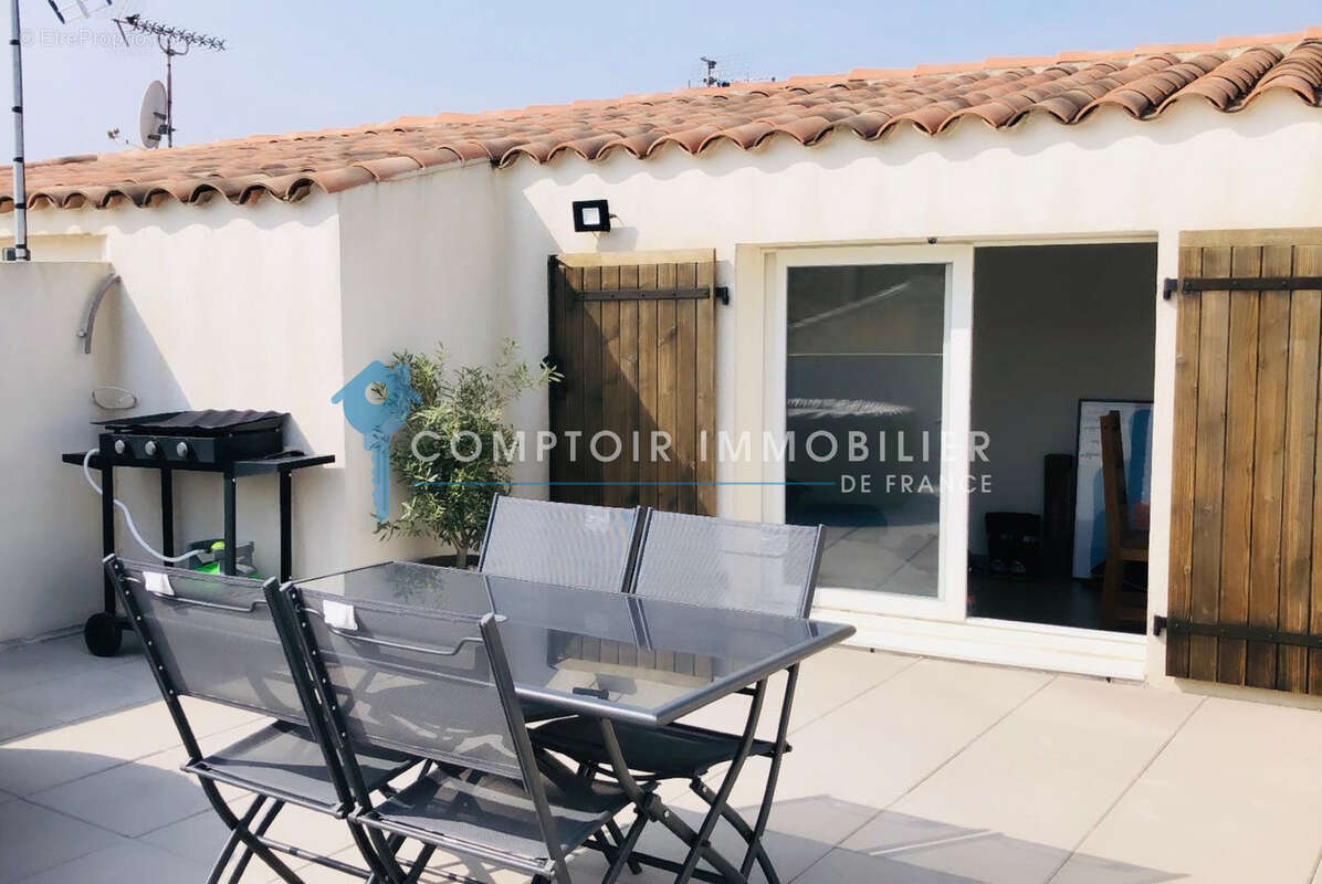 Appartement avec terrasse et garage à Vauvert - photo 3