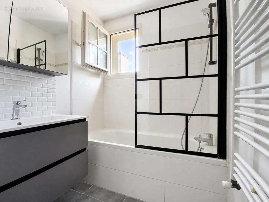 Maison de 7 pièces de 116 m² à Ennery - photo 11
