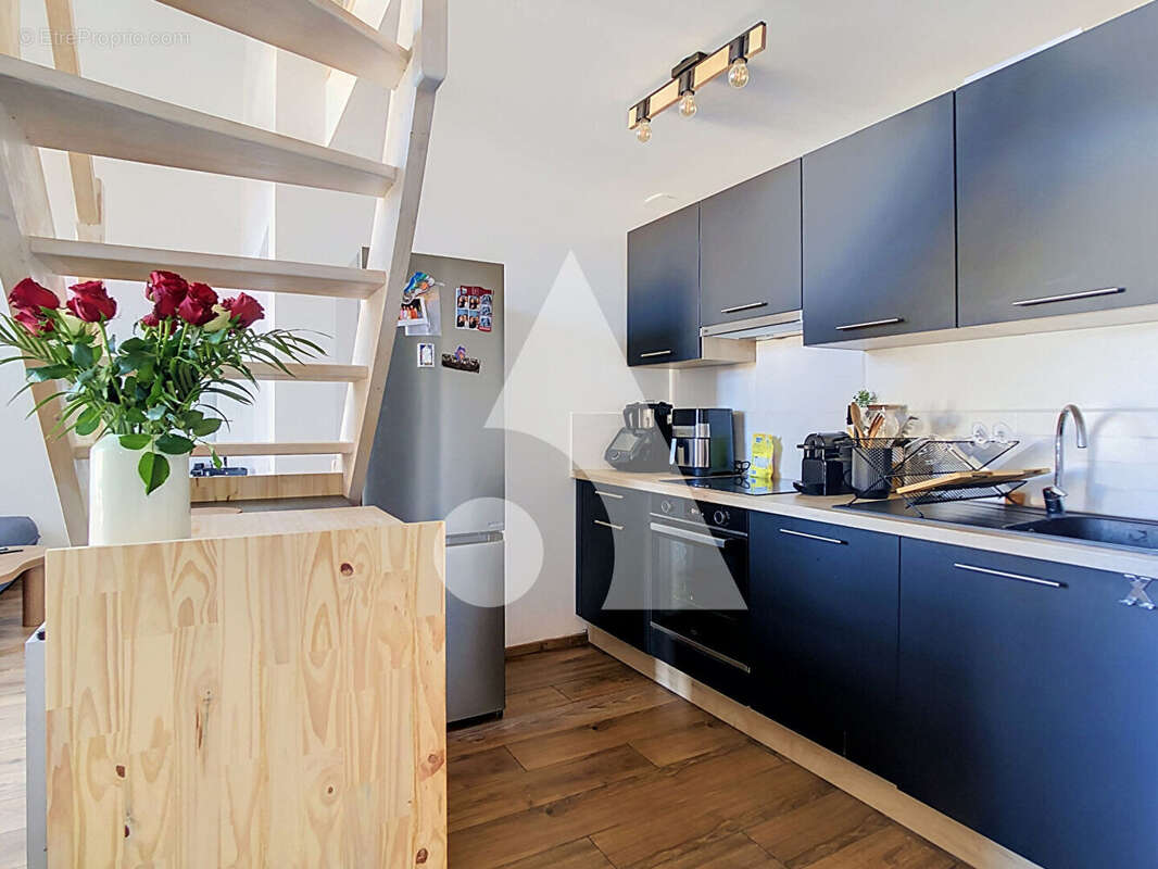 Appartement Chazelles Sur Lyon 3 pièce(s) avec balcon - photo 3