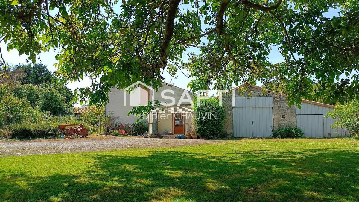 Photo 1 - Maison à AIGREFEUILLE-D'AUNIS