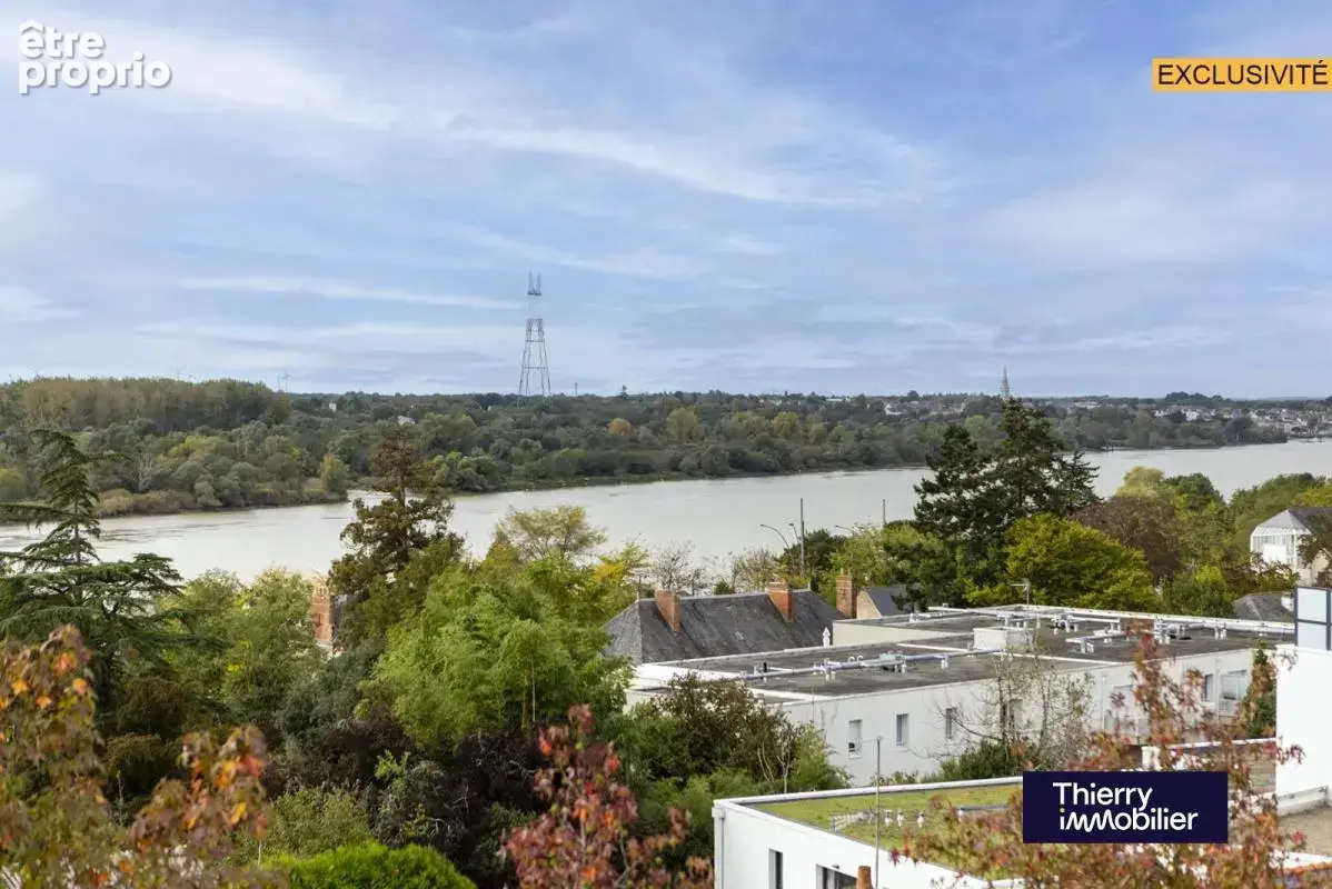 Superbe t3 couëron bourg - vue imprenable sur la loire - photo 8