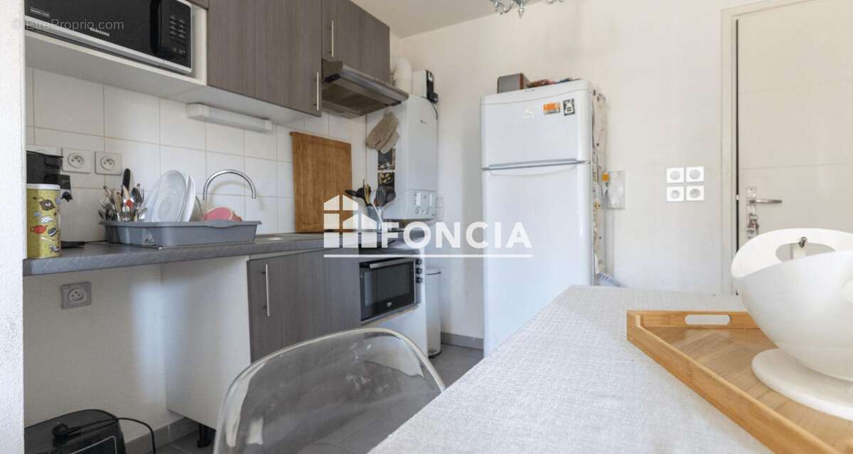 Appartement T2 avec place de parking - photo 2