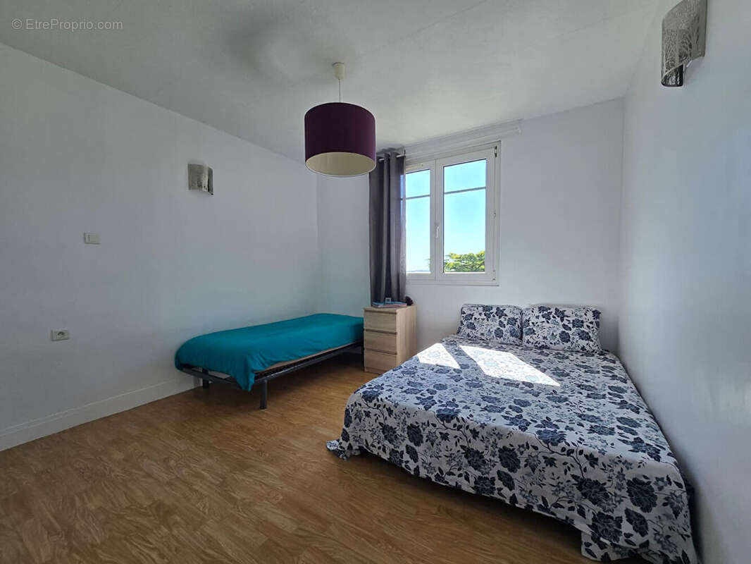 Appartement T4 - Dernier étage avec balcon - photo 3