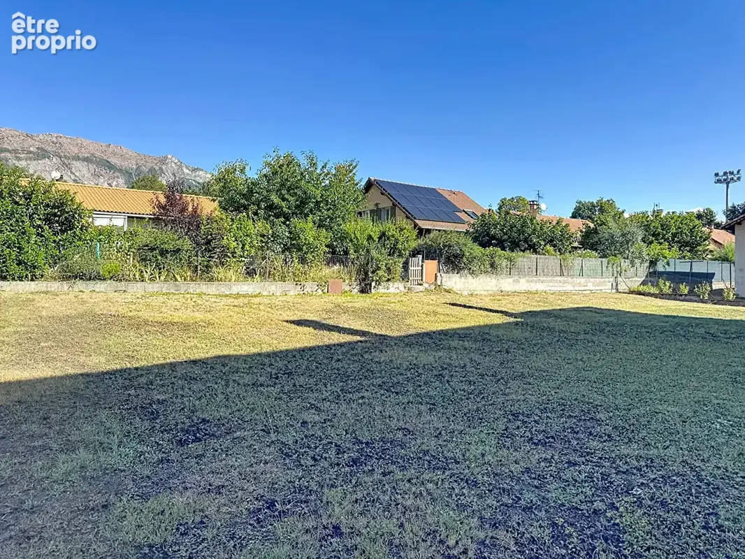 Maison familiale Type 7 de 151.25 m² avec grand rez-de-chaussée, terrain plat de 1 228 m² et vue montagnes ! - photo 15