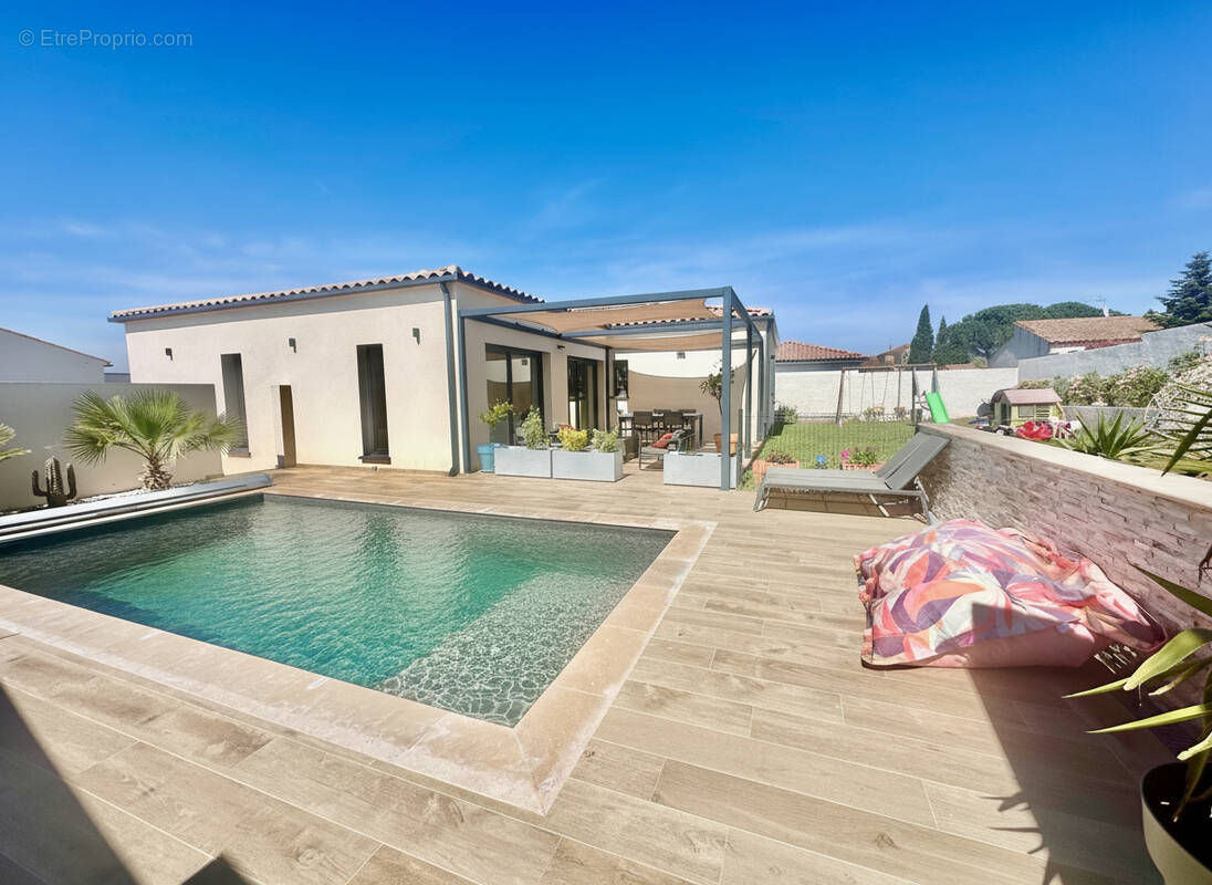 Maison à MARCORIGNAN