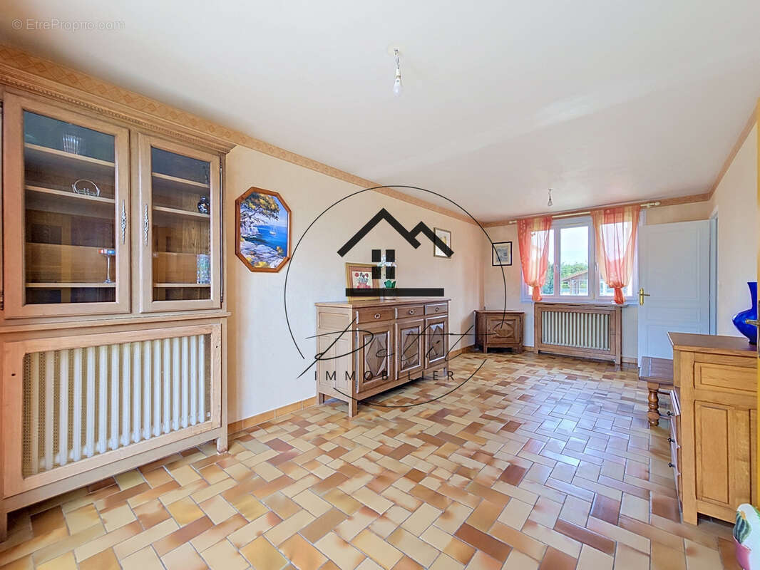 Maison familiale de 107 m2 avec 4 chambres et sous-sol total - photo 3