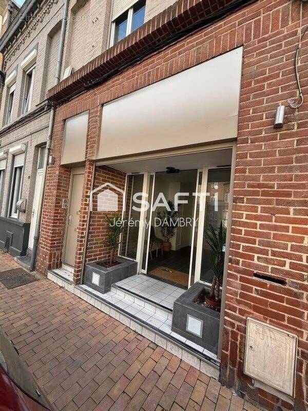 Photo 1 - Commerce à FACHES-THUMESNIL