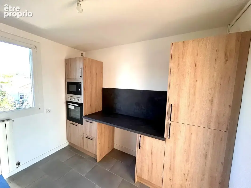 Appartement 3 pièces 52 m² à vendre à Roanne (42300) - photo 6