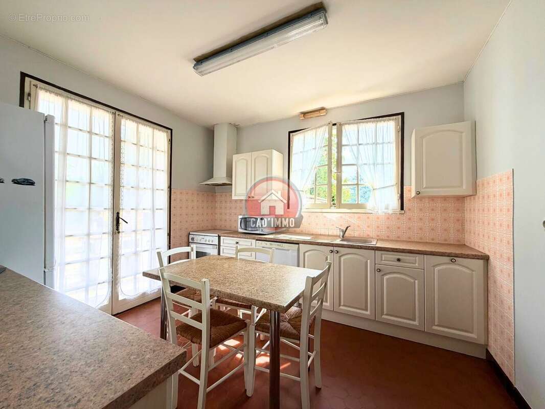 Plain pied de 116 M² 4 chambres, et garage. - photo 4