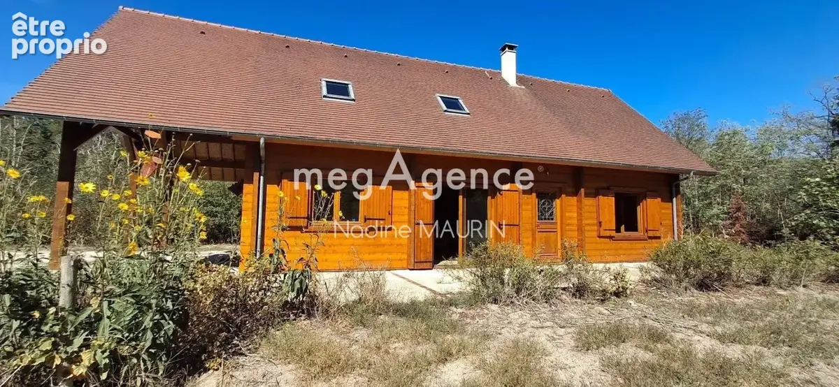 Chalet en bois de 138 m² de 4 chambres sur un terrainde 73862m² - photo 2