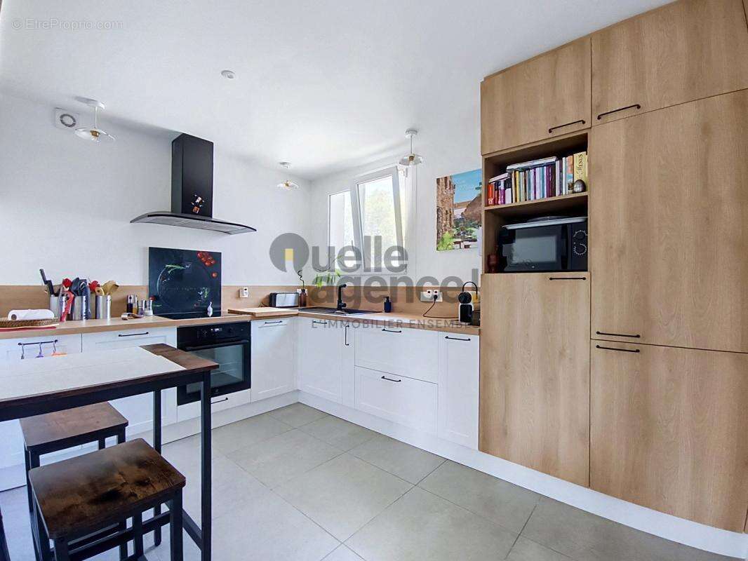 Clé en main : T4 rénové, balcon spacieux et parking privé - photo 7