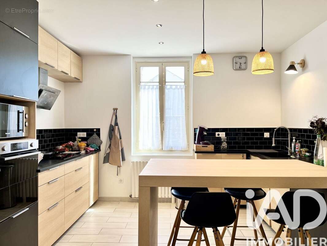Photo 1 - Maison à SAINT-LEONARD-DE-NOBLAT
