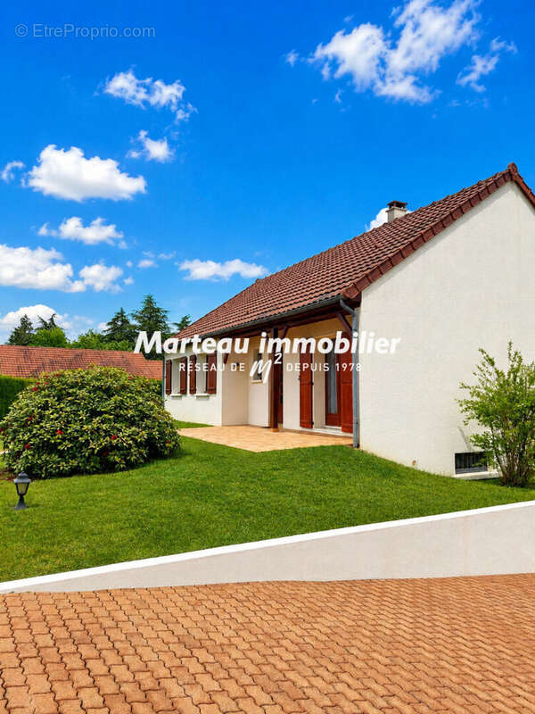 Maison  4 pièces 87.90 m² - photo 2