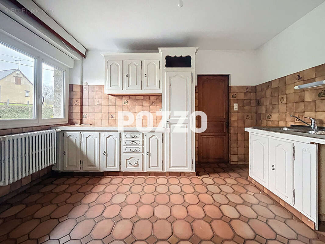 Maison à JUVIGNY-LE-TERTRE