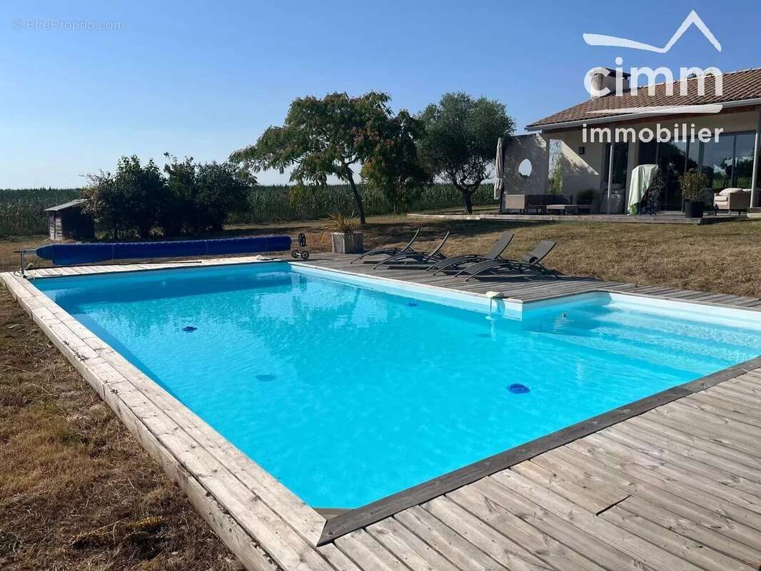 POUCHARRAMET —Villa d'architecte – 160 m² – Piscine – Parc de 3 500 m² – Vue campagne, lac et Pyrénées - photo 11
