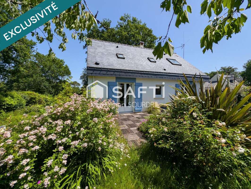 Photo 2 - Maison à SAINT-JEAN-LA-POTERIE