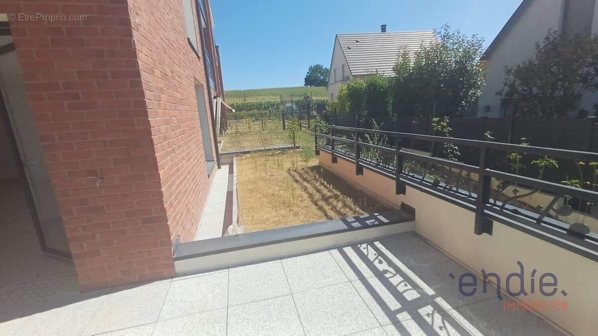 À 8 minutes de Sierentz  Superbe appartement 3 pièces avec terrasse et jardin privatif - photo 2