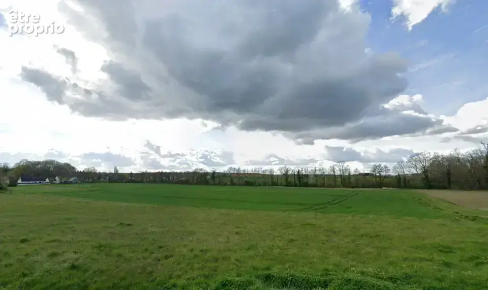 Photo Terrain à Mareil-Le-Guyon au prix de 215 000€