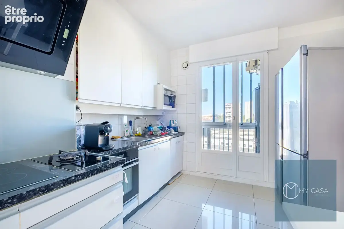 Villeurbanne - Appartement rénové de 91,17 m2 avec balcon - photo 4