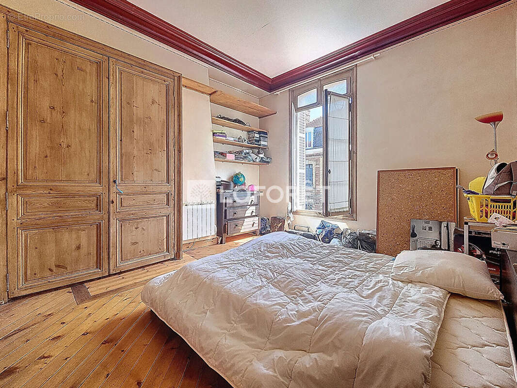 Appartement T2 - 48 m2 - proche champ de foire - photo 6