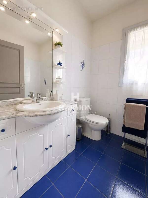 Harmon à vendre :  Élégante maison de plain-pied avec piscine à Pau - photo 11