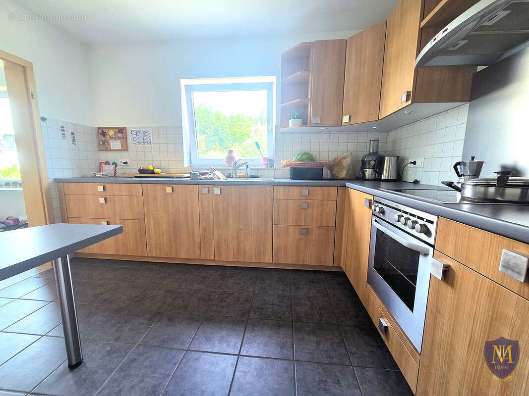 Blotzheim très au calme belle maison 6 pièces de 125 m2 sur 7,91 ares - photo 5