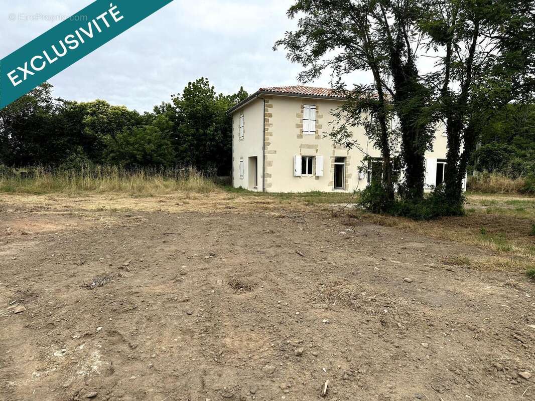 Photo 2 - Maison à SAINT-PIERRE-DE-MONS