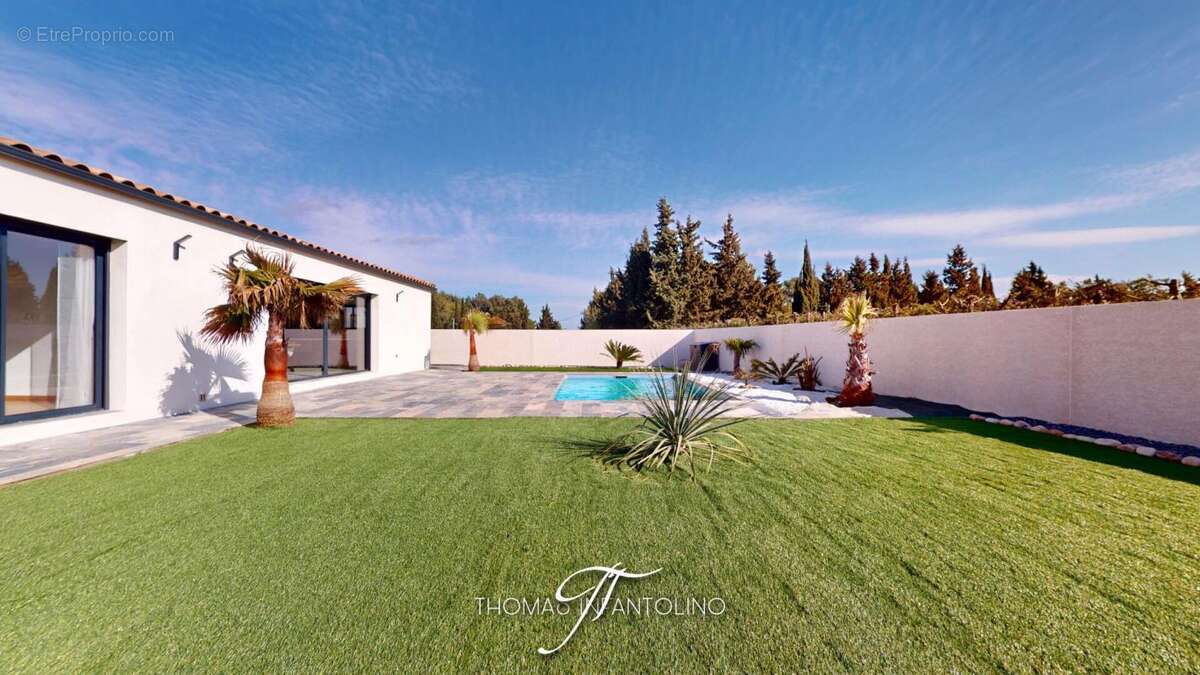 En exclusivite - plain pied - 4 chambres - piscine - garage - photo 3