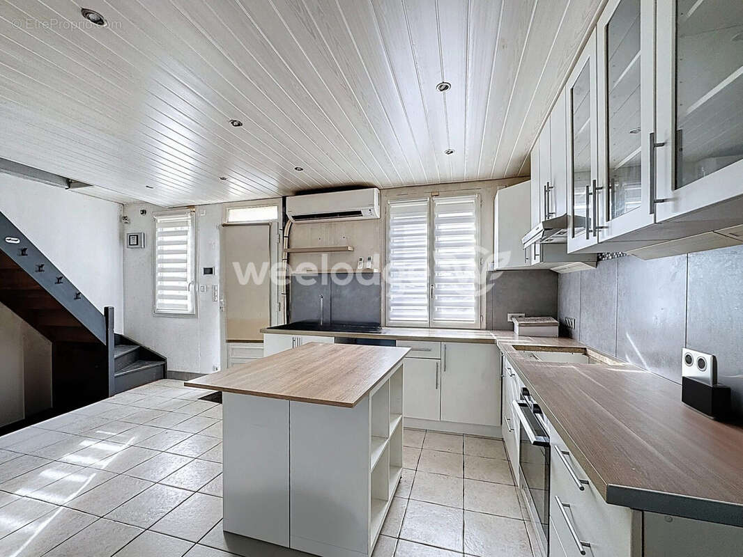 Maison à CHANTELOUP-LES-VIGNES