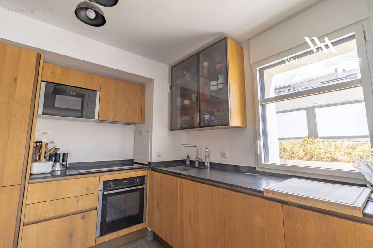 Appartement 4 pièces 85 m² à vendre à Levallois-Perret (92300) - photo 9
