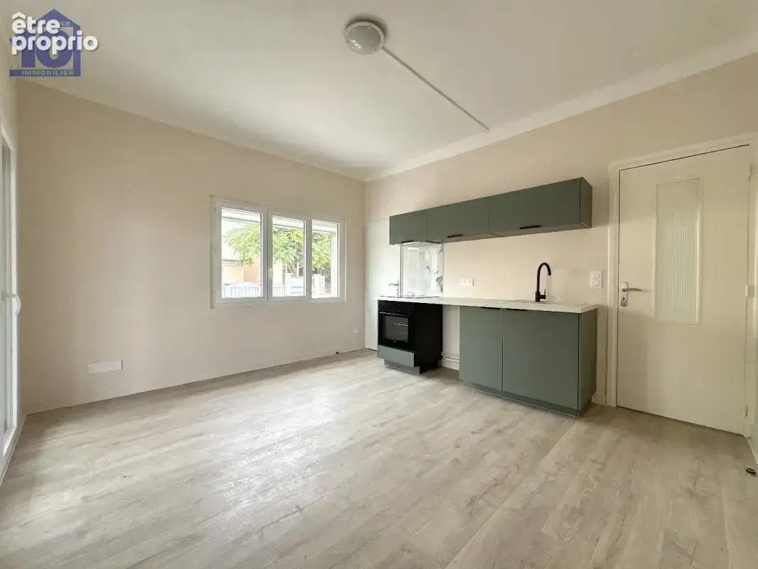Appartement en rez-de-jardin - photo 2