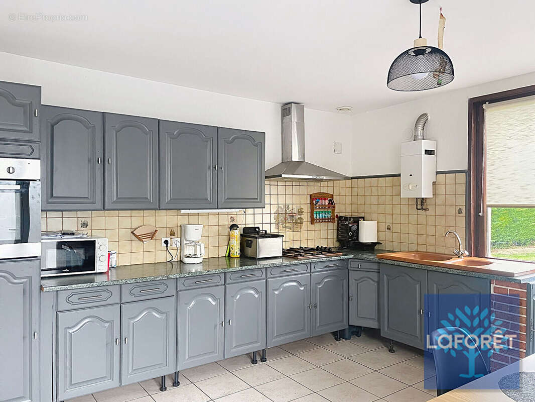 Maison à DOUCHY-LES-MINES