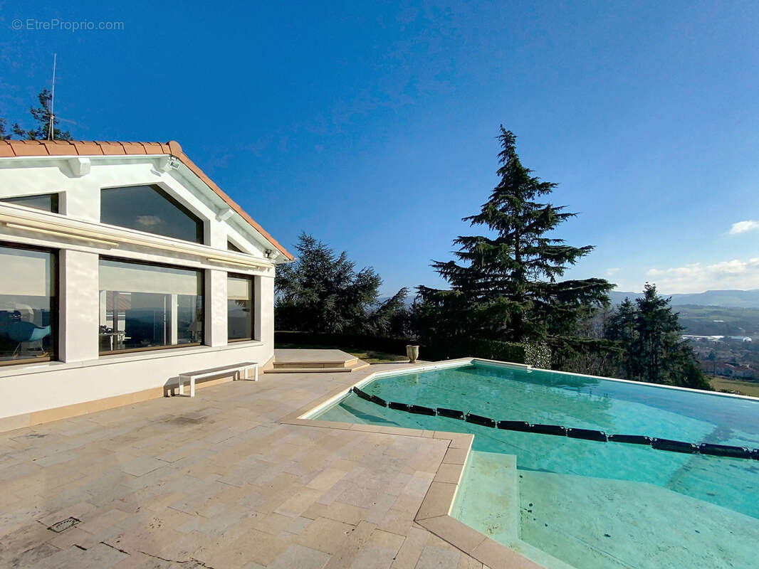 Maison à LA TALAUDIERE