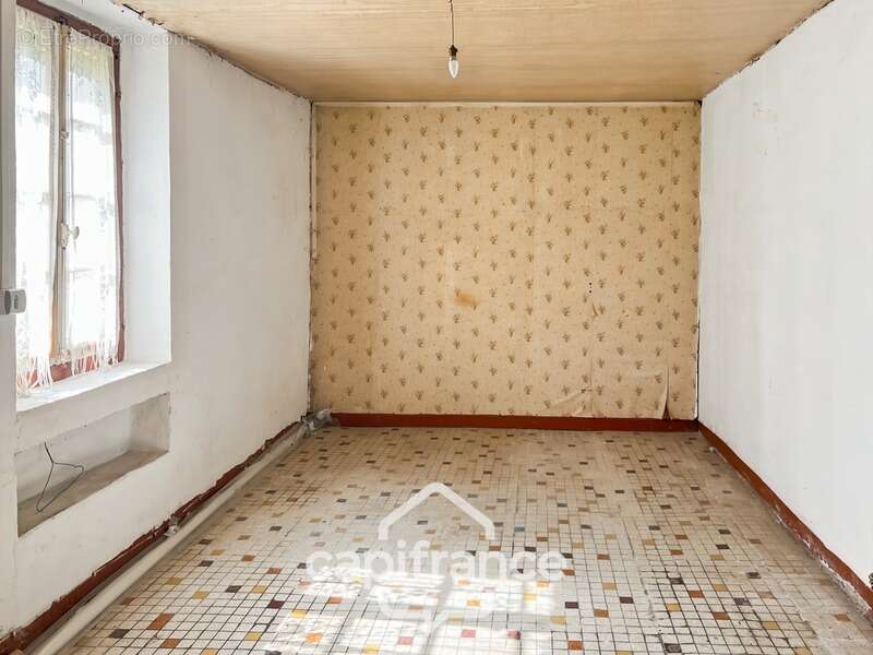 Maison à SAINT-ROMAIN-LE-NOBLE