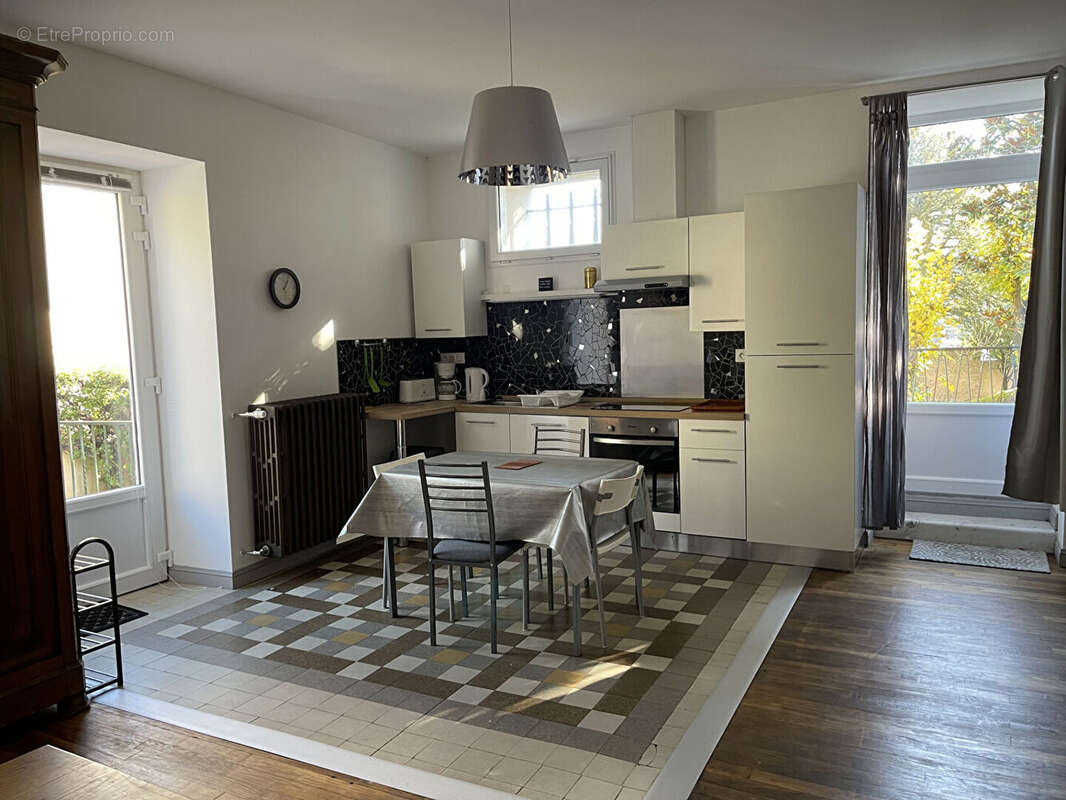 Appartement T3 81,57 m² + parking+cave - photo 2