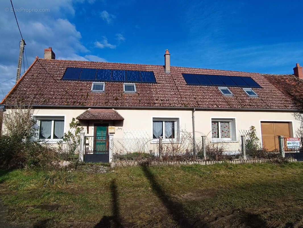 Maison à GARIGNY