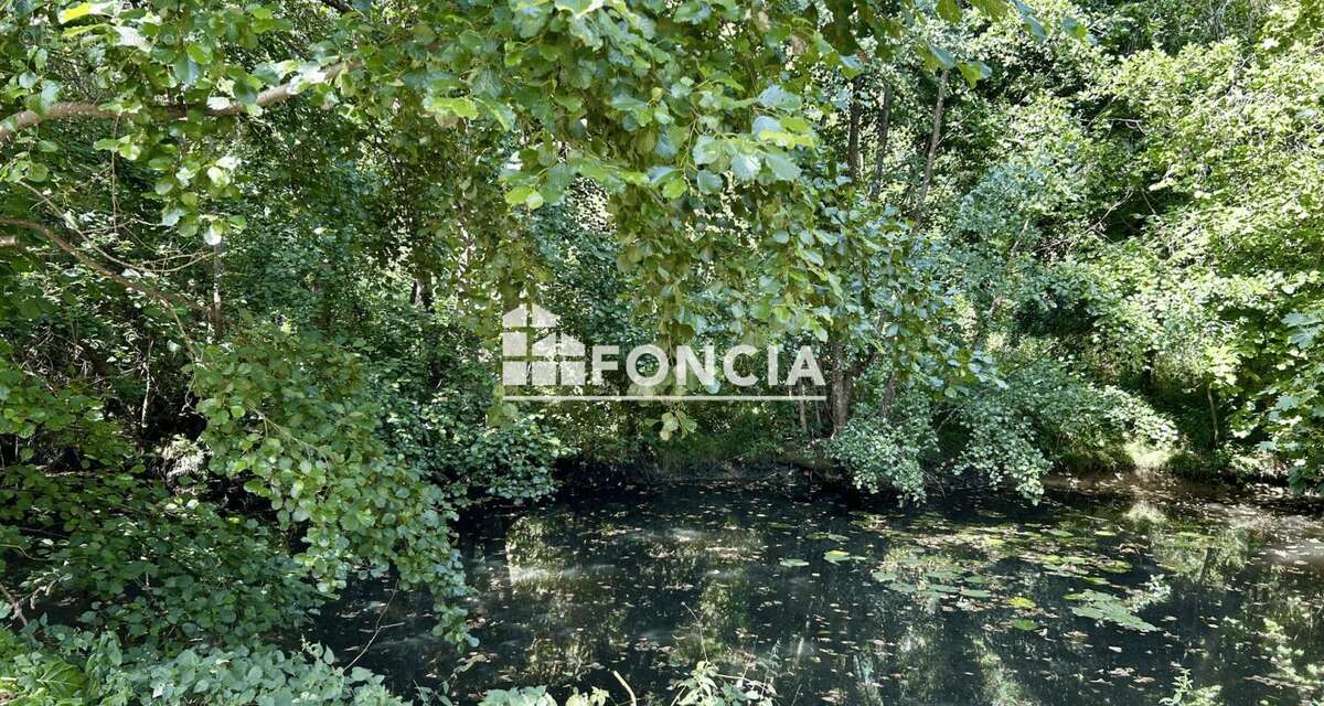 SUPERBE LONGERE de 200 m2 sur 2 400 m2 de terrain arboré avec vue sur rivière - photo 13
