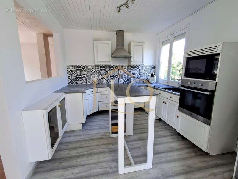 Chapitre Deux - Maison de plain pied de 91m² - 5 pièces - 3 chambres - 365m² de terrain - photo 2
