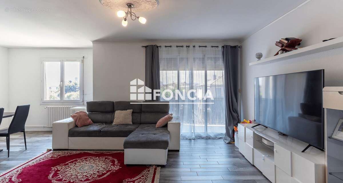 Appartement T3-76m2 - photo 2